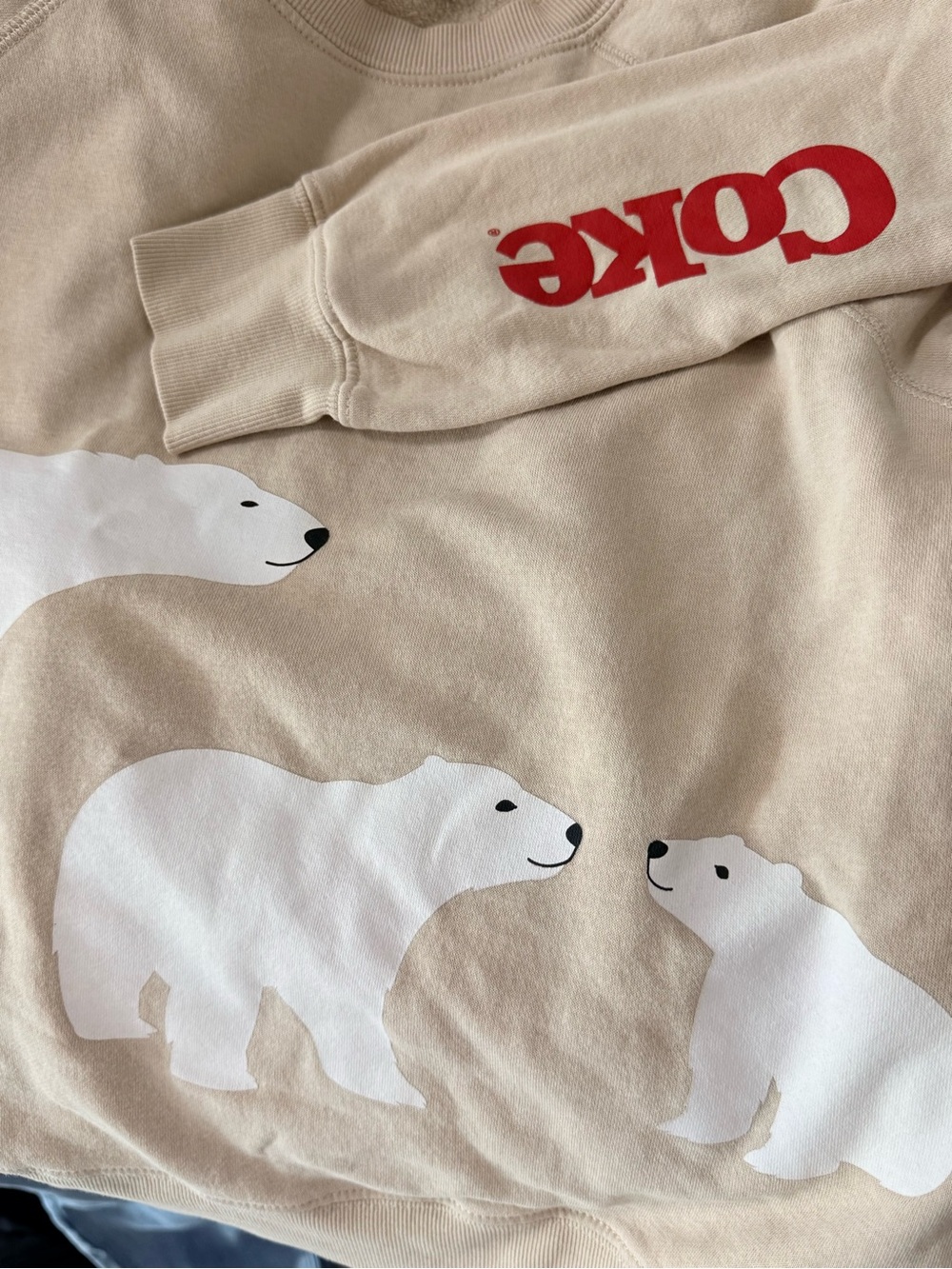 Coca Cola Beige Sweatshirt with White Polar Bear Trio and Red 'Coke' Sleeve Logo - Picture 3 of 5